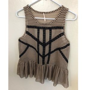 Sleeveless tank with peplum